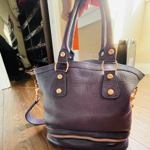 Jaeger deep purple pebbled leather bag.